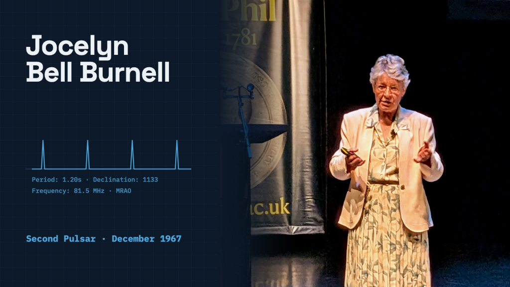 Jocelyn Bell Burnell phát biểu trên sân khấu với phông nền tối tại Manchester