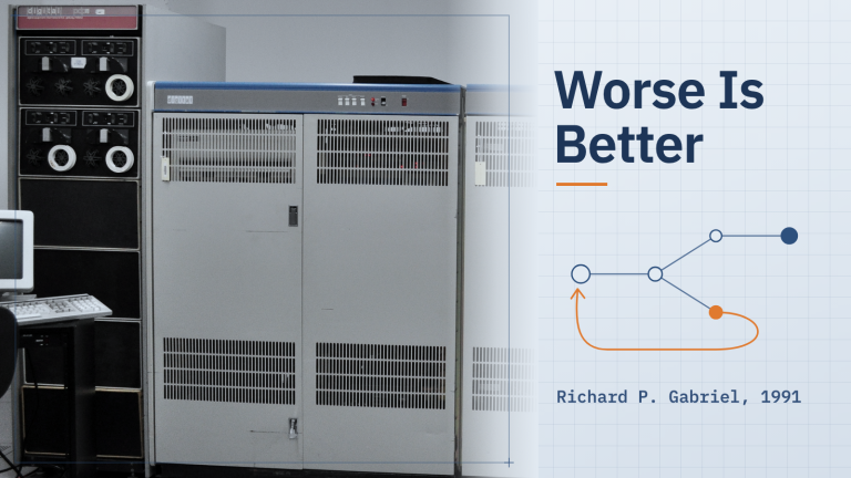 Các tủ máy tính DEC và một giá ổ băng từ trong một viện bảo tàng, bên cạnh dòng chữ “Worse Is Better” và “Richard P. Gabriel, 1991”, cùng một sơ đồ đường nét mô tả một lời gọi vòng ngược về để thử lại.
